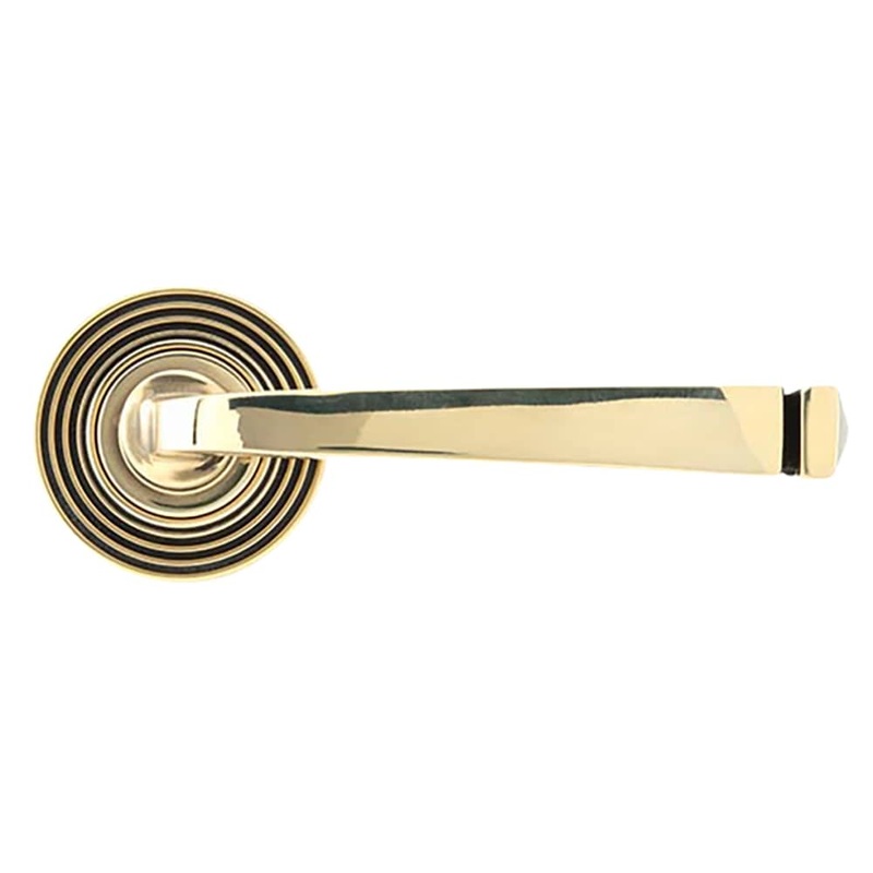 From The Anvil Avon Door Handle on Reeded Beehive Rose – Aged Brass