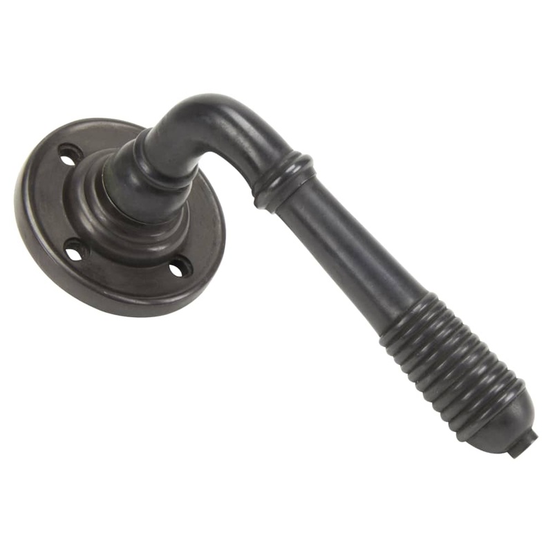 From The Anvil Reeded Beehive Door Handle on Rose – Aged Bronze