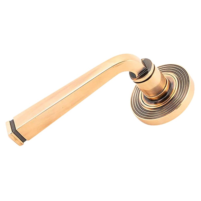 From The Anvil Avon Door Handle on Reeded Beehive Rose – Polished Bronze