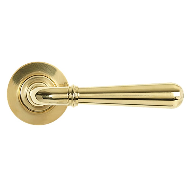 From The Anvil Newbury Door Handle on Plain Rose – Polished Brass