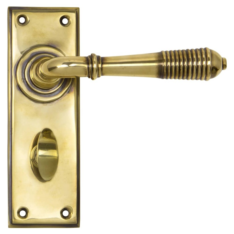From The Anvil Reeded Bathroom Door Handle – 152 x 50mm – Aged Brass