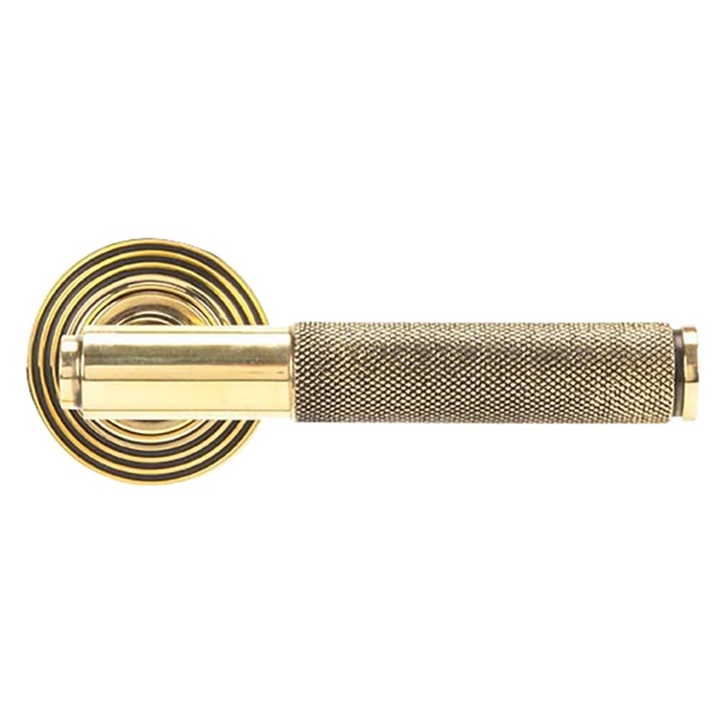 From The Anvil Brompton Knurled Door Handle on Reeded Beehive Rose – Aged Brass