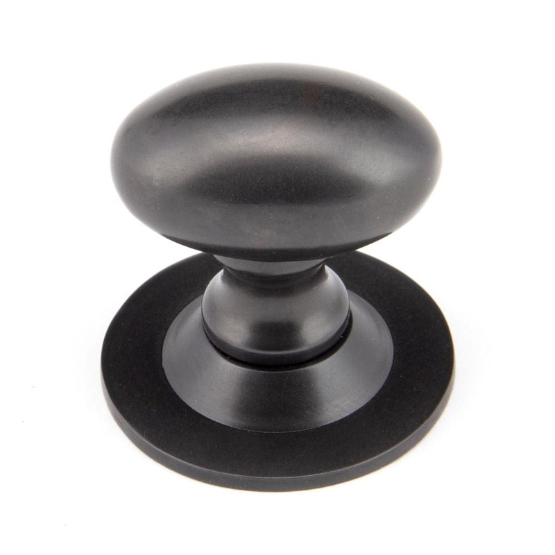 From The Anvil – Aged Bronze Oval Cabinet Knob 33mm
